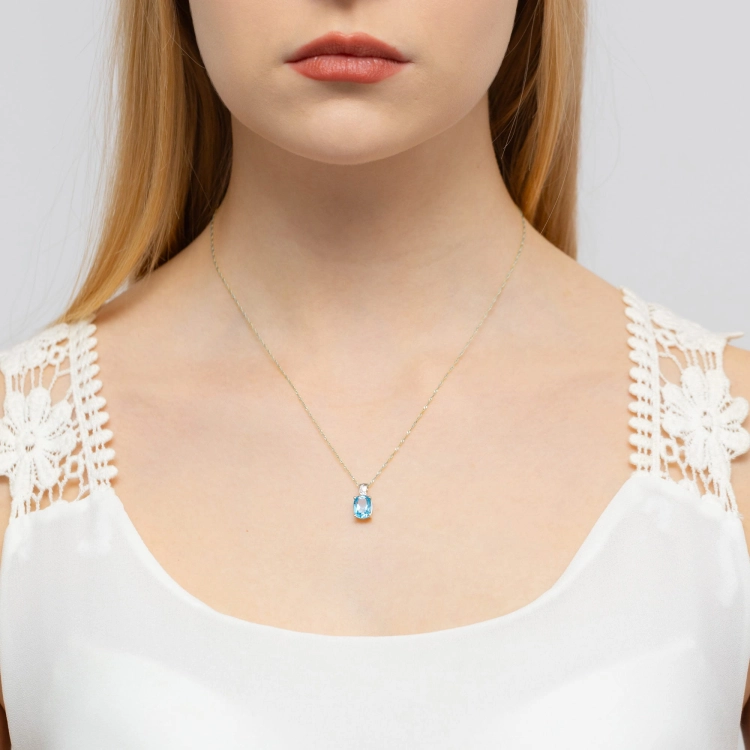 Zawieszka z białego złota 585 z topazem i diamentem 0,005ct The Diamonds
