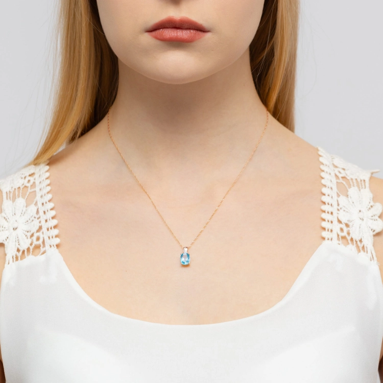 Zawieszka z różowego złota 585 z topazem i diamentem 0,005ct The Diamonds