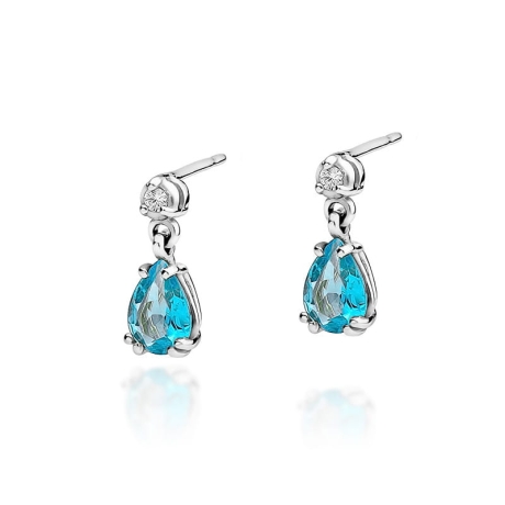 Przejdź do produktu Kolczyki z białego złota 585 z topazem i diamentami 0,04ct The Diamonds