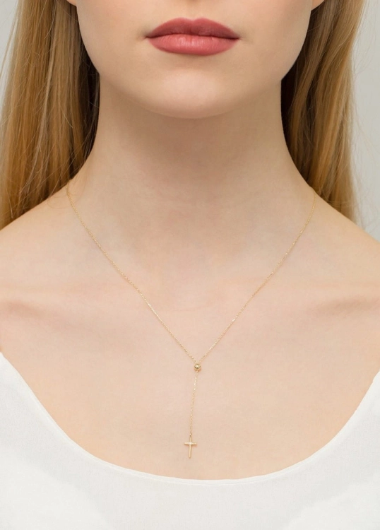 Naszyjnik z żółtego złota z diamentem 0,0145ct krzyżyk The Diamonds BC-65