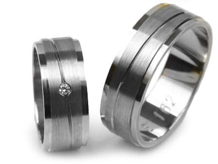 Obrączki ślubne z białego złota płaskie z cyrkonią 7mm Estetic E162-b